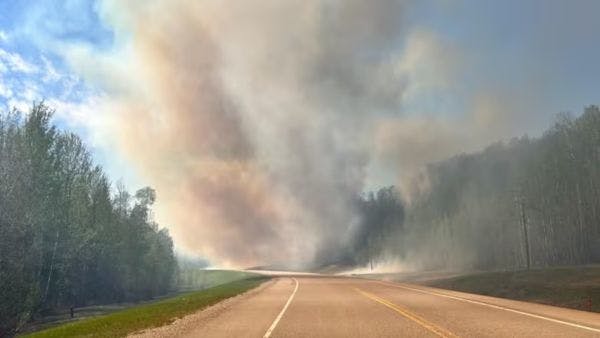 Canadian Wildfires Trigger Mass Evacuations and Cross-Border Smoke Concerns